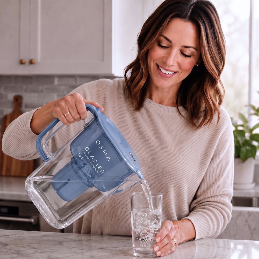 Filtered water pouring into a glass